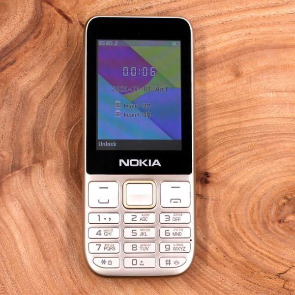 Кнопковий мобільний телефон у металевому корпусі Nokia C5-00 (2021) Gold